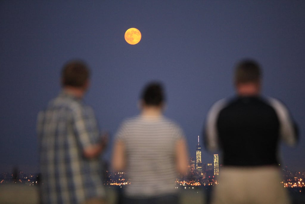 People checked out the first "supermoon" of the Summer in NYC.