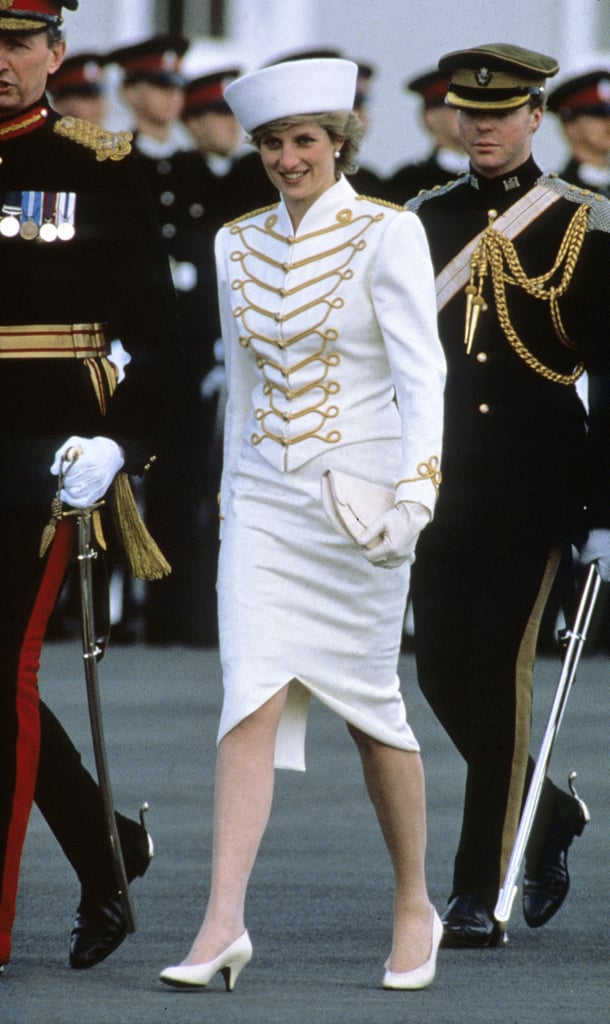 In 1987 Diana channeled military chic in a white and gold two-piece by her favorite designer Catherine Walker.