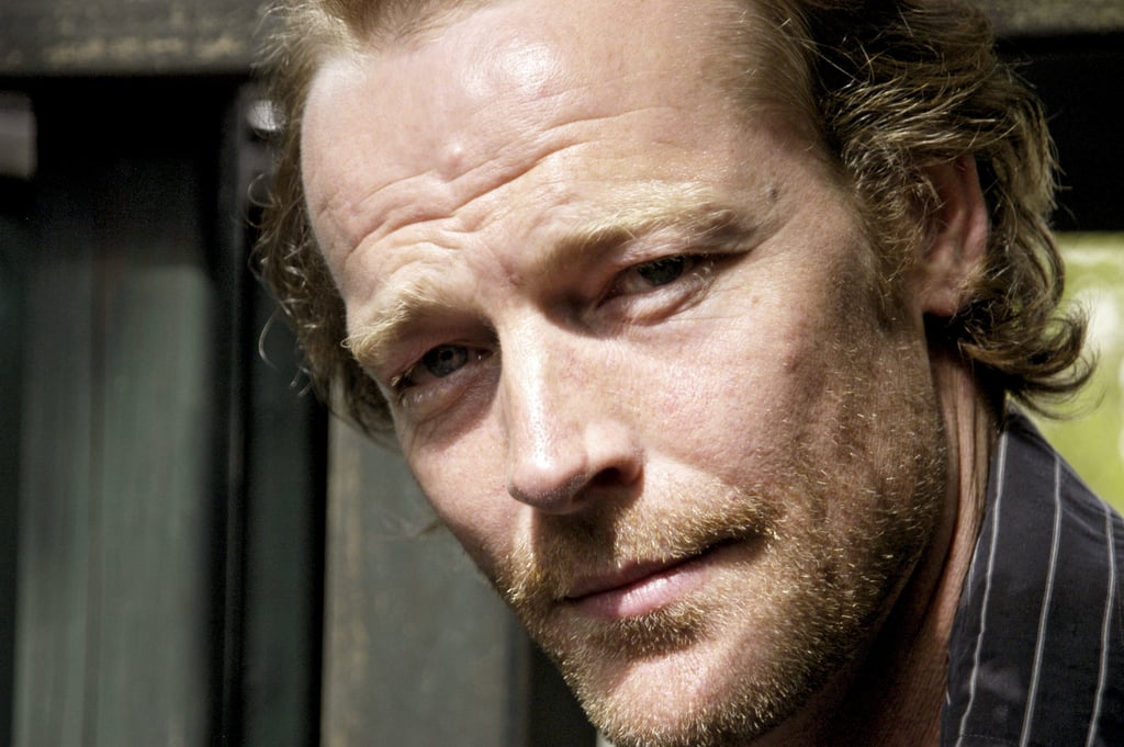 He posed for a photo in London in 2004.