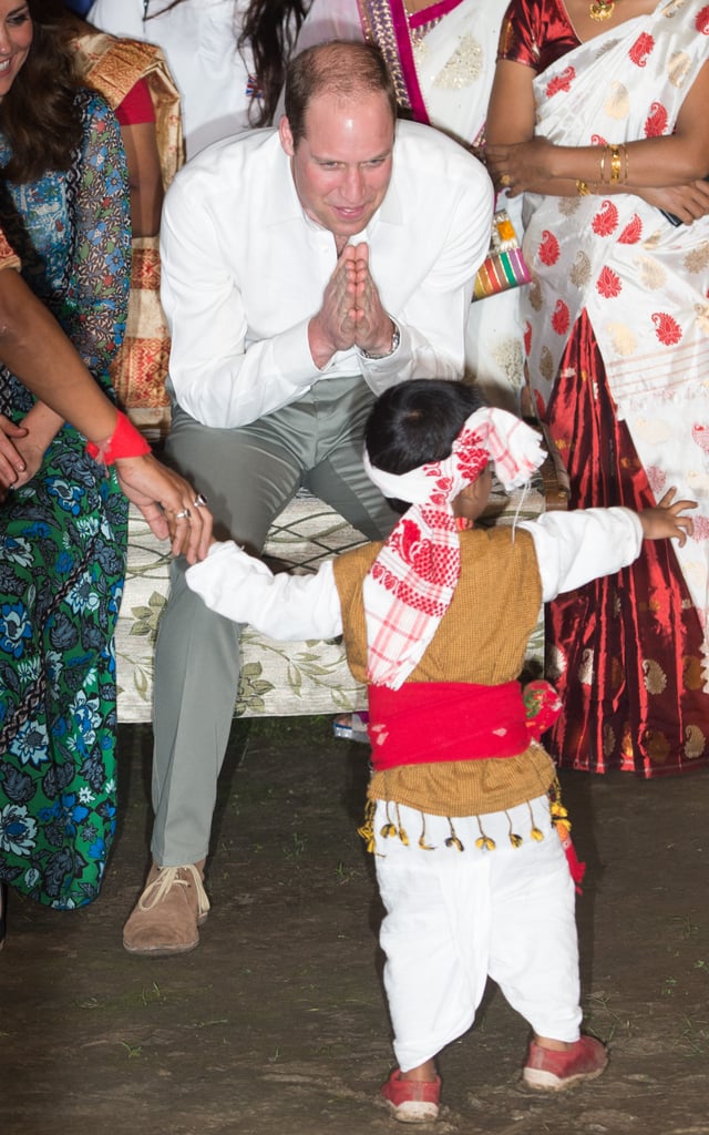 William bowed to a little boy as he performed for the couple during a Bihu Festival Celebration in India in April 2016.