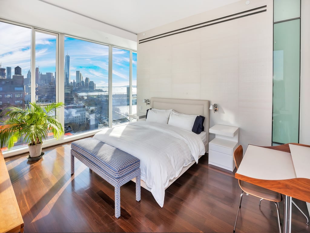 The master bedroom suite includes sweeping views and Wenge hardwood floors.