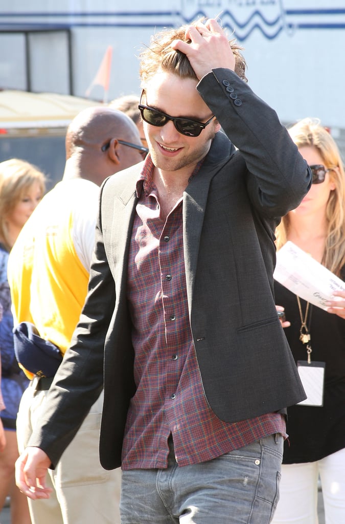 Rob gave his hair a last minute toss before taking his seat at the August 2009 Teen Choice Awards in LA.