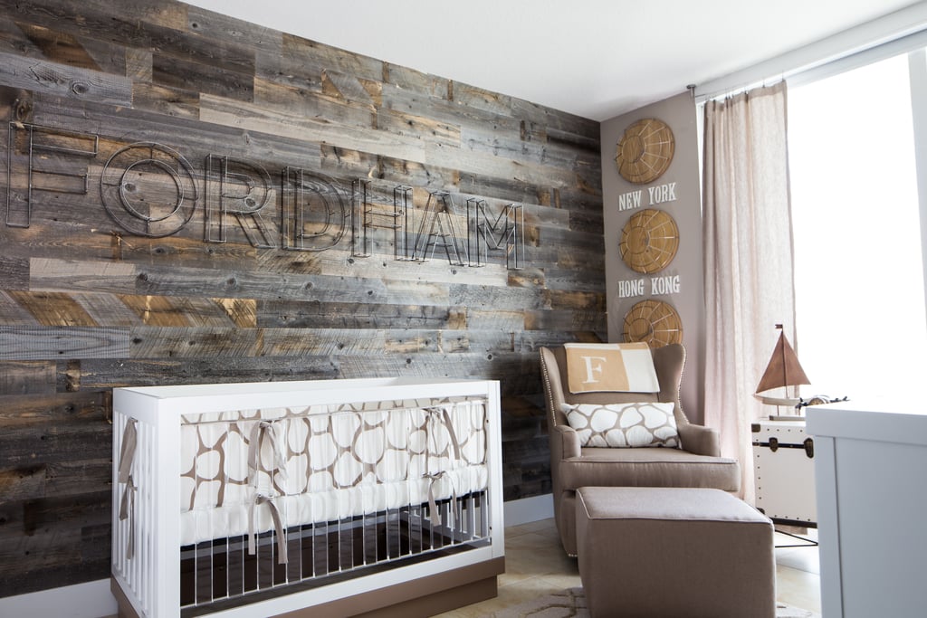 A wood plank accent wall endows this nursery with a serious dose of rustic elegance.