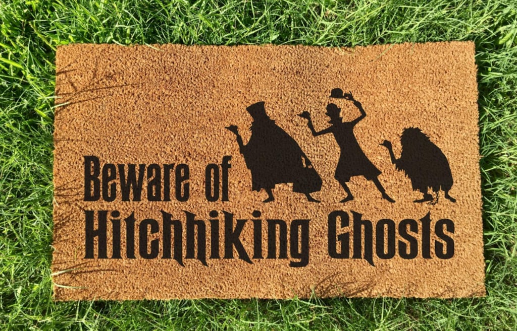 The Haunted Mansion Hitchhiking Ghosts Door Mat