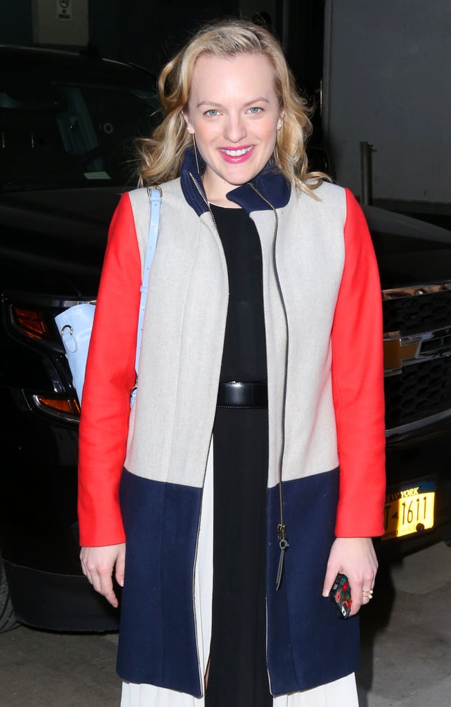 Elizabeth Moss was all smiles during her NYC outing on Thursday night.