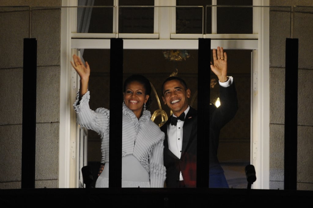 Barack and Michelle Obama waved from a window at Oslo's Grand Hotel in December 2010 after President Obama accepted the Nobel Peace Prize.