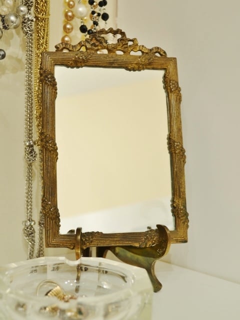 And an antique mirror keeps everything in check.
If you have limited space for storage, organizers are a great way to stash small items. But don't forget to take advantage of the vertical wall space that's usually available to you.
Check out more decor inspiration from Hometalk:

Herringbone Pattern Accent Wall
An Inspired Ikea Playroom
DIY Coastal Dining Room Makeover