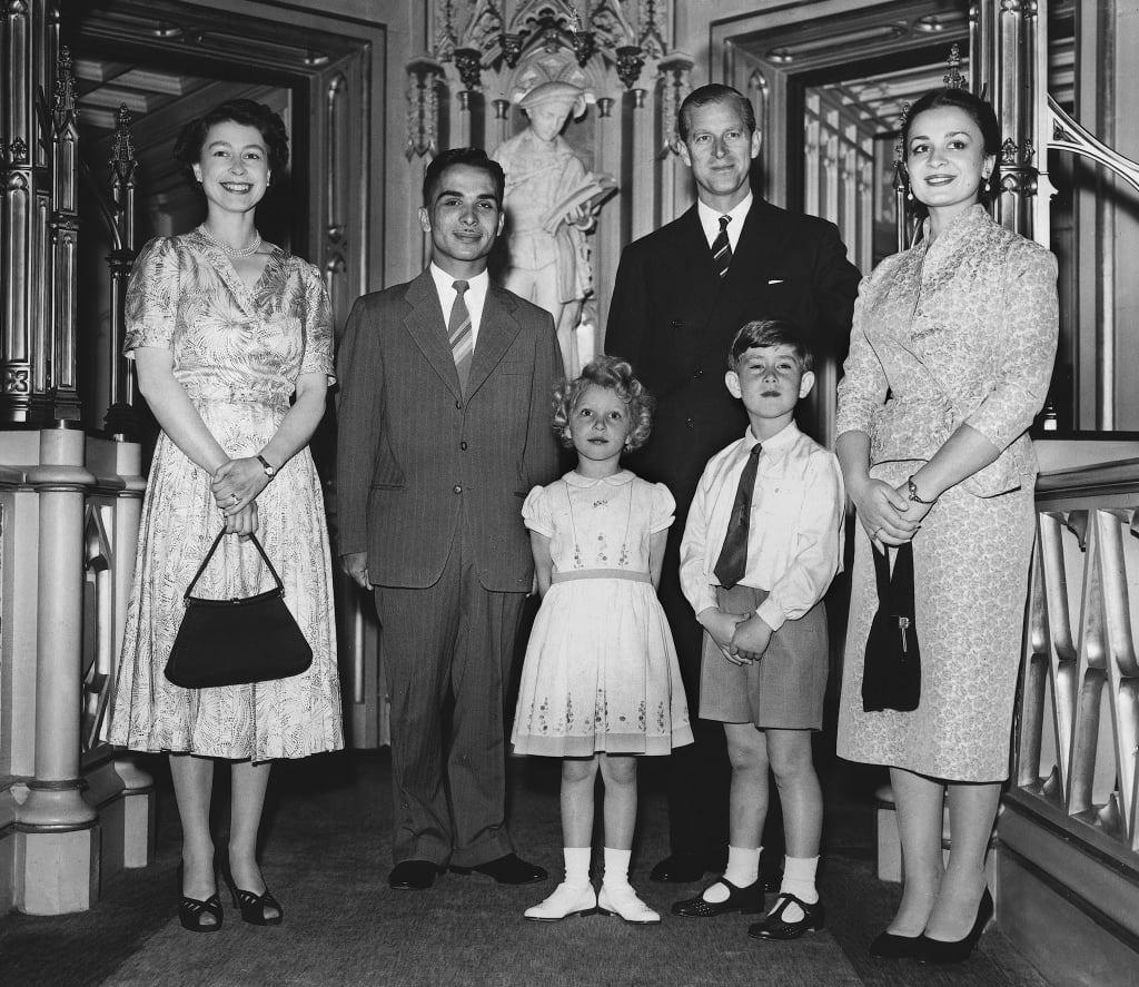 The royal family posed with King Hussein of Jordan and his wife Queen Dina during their honeymoon in England in 1955.