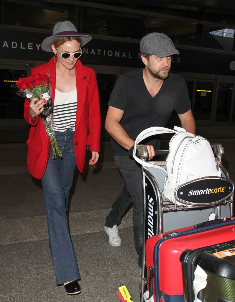 Joshua Jackson Brings Diane Kruger Roses at LAX