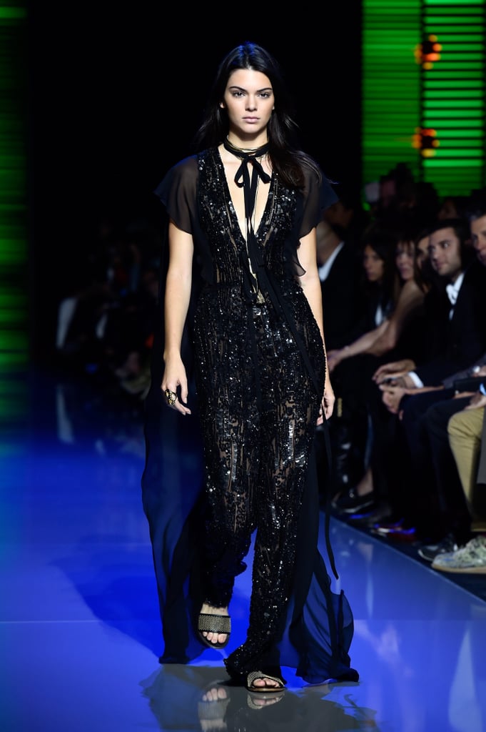 Kendall lit up the runway at Elie Saab wearing a shimmering black jumpsuit.