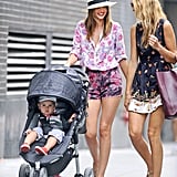 Miranda Kerr carried off mix-and-match florals with confidence and a totally carefree vibe that makes the playful prints feel sophisticated and cool — especially topped with her panama hat.