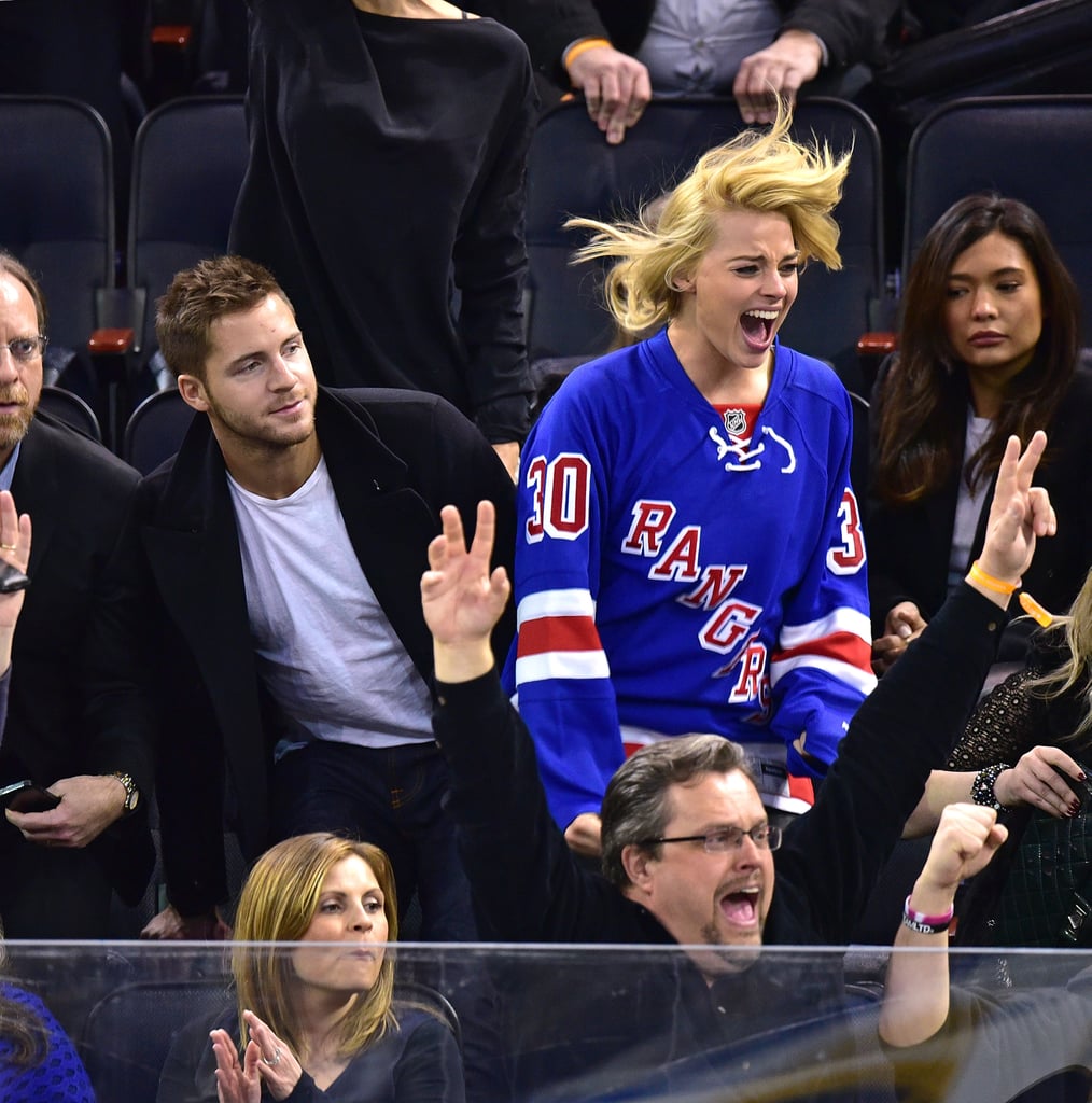 Margot Robbie couldn't hold in her excitement while watching the New York Rangers game with her boyfriend, Tom Ackerley, in February 2015.