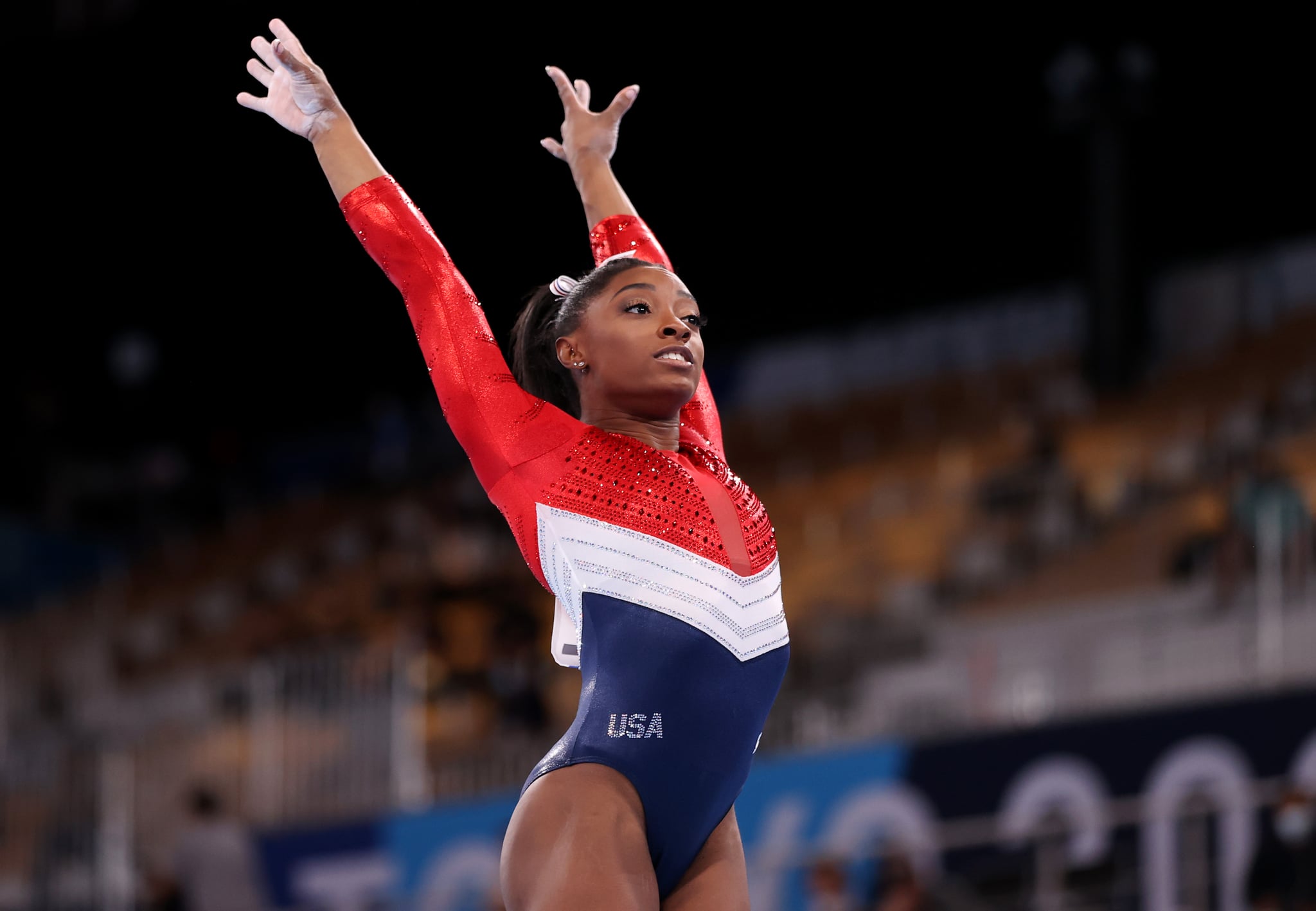 TOKYO, JAPAN - JULY 27: Simone Biles of Team United States competes on vault during the Women's Team Final on day four of the Tokyo 2020 Olympic Games at Ariake Gymnastics Centre on July 27, 2021 in Tokyo, Japan. (Photo by Laurence Griffiths/Getty Images)