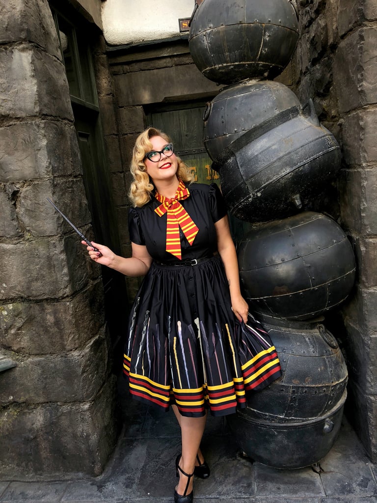 It's no surprise brave Gryffindors will rock a colorful dress like this one equipped with wands of their very own.