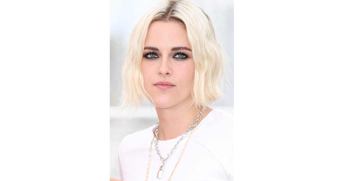 Kristen Stewart's bleachblond hair was parted in the middle and