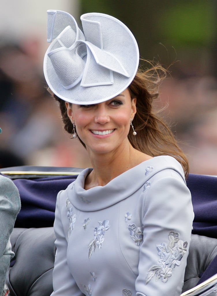To match her gray Erdem dress at the Trooping the Colour ceremony in 2012, Kate added interest with a hat by Jane Corbett.