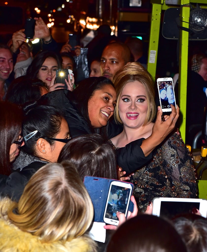 Adele Poses With Fans Outside Radio City Music Hall 2015