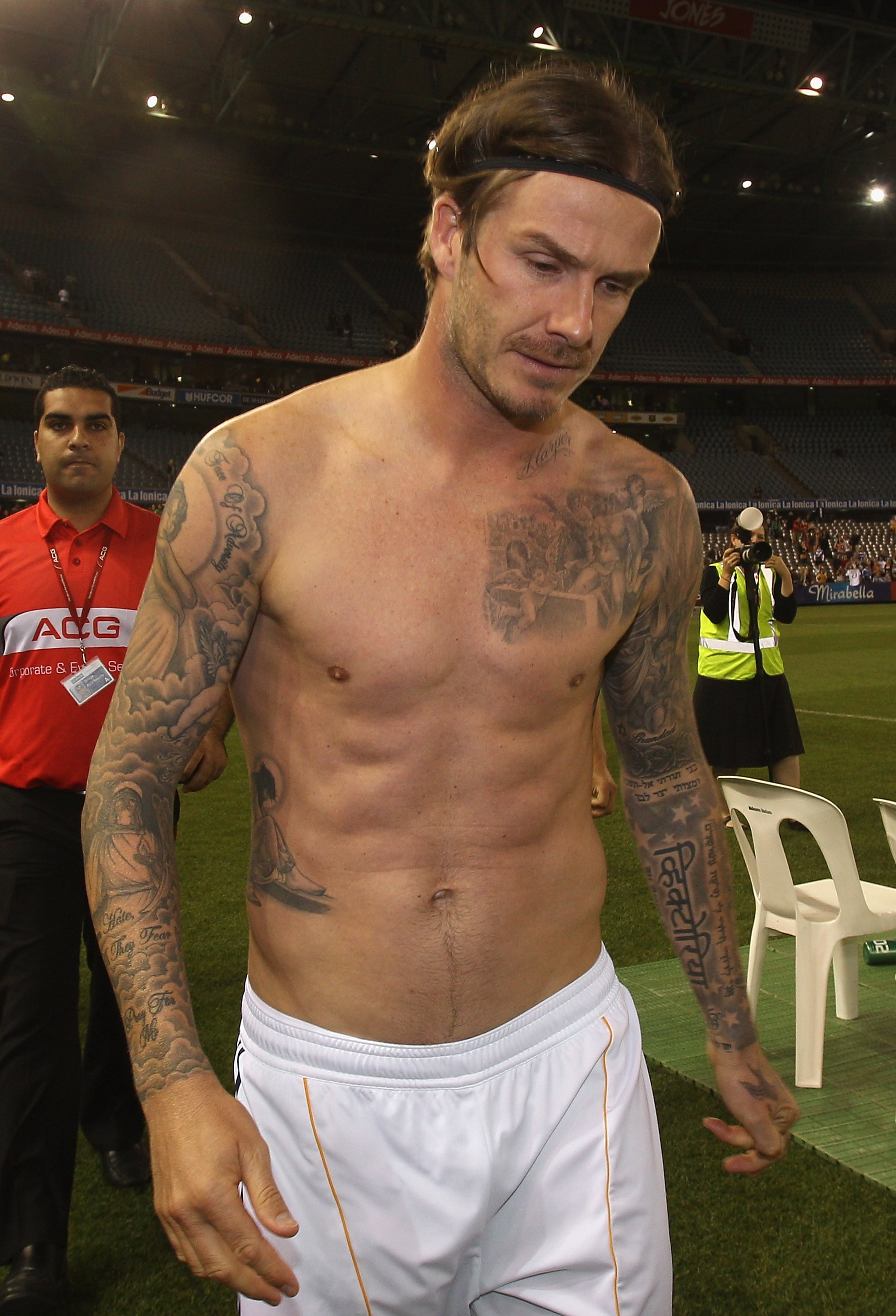 David Beckham Flashes His Flesh To Show Off New Chinese Tattoo | Marie  Claire UK