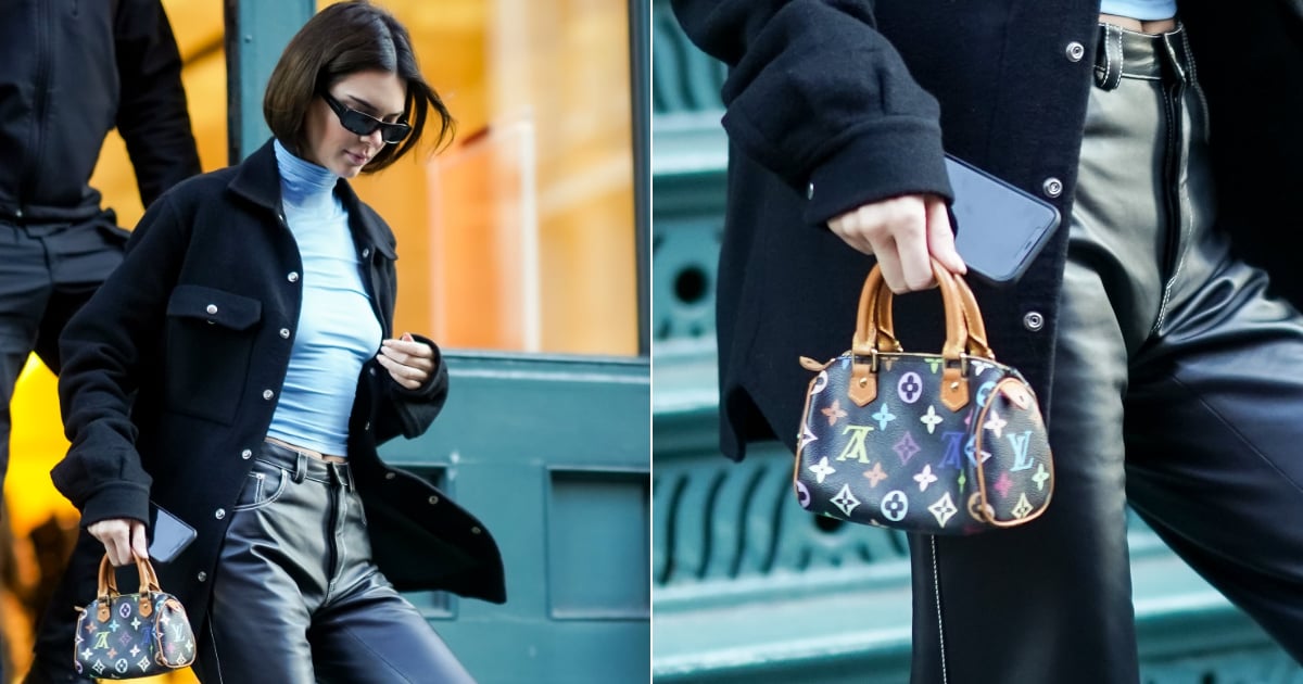 Kendall Jenner wearing Louis Vuitton Key Pouch in Cherry Monogram
