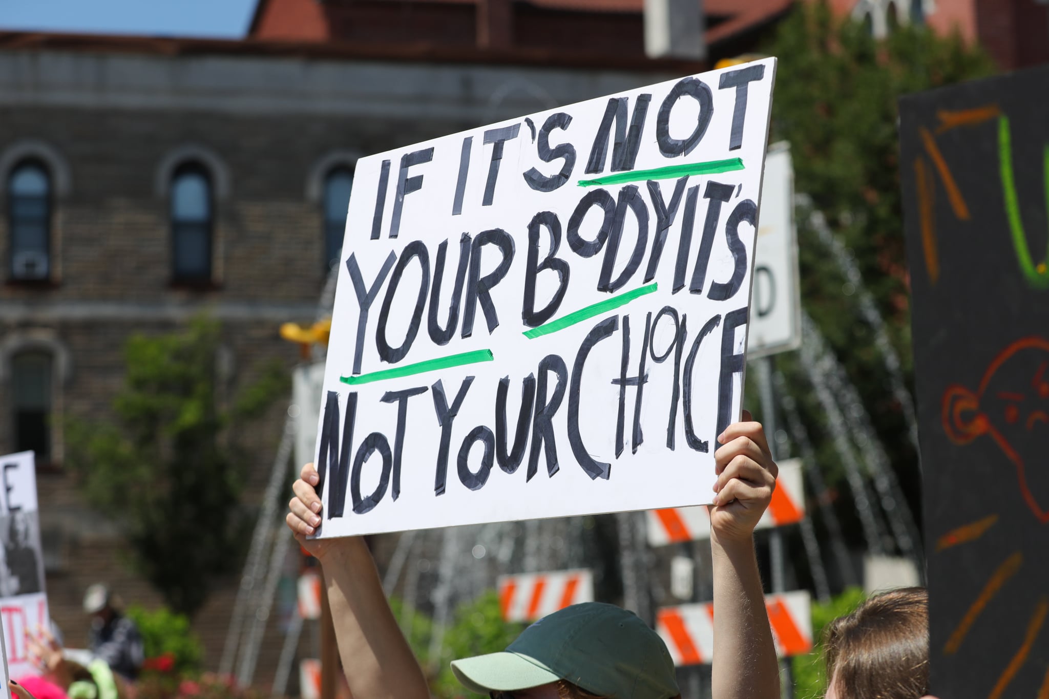 BLOOMSBURG, PENNSYLVANIA, UNITED STATES - 2022/07/03: A demonstrator holds a placard saying 