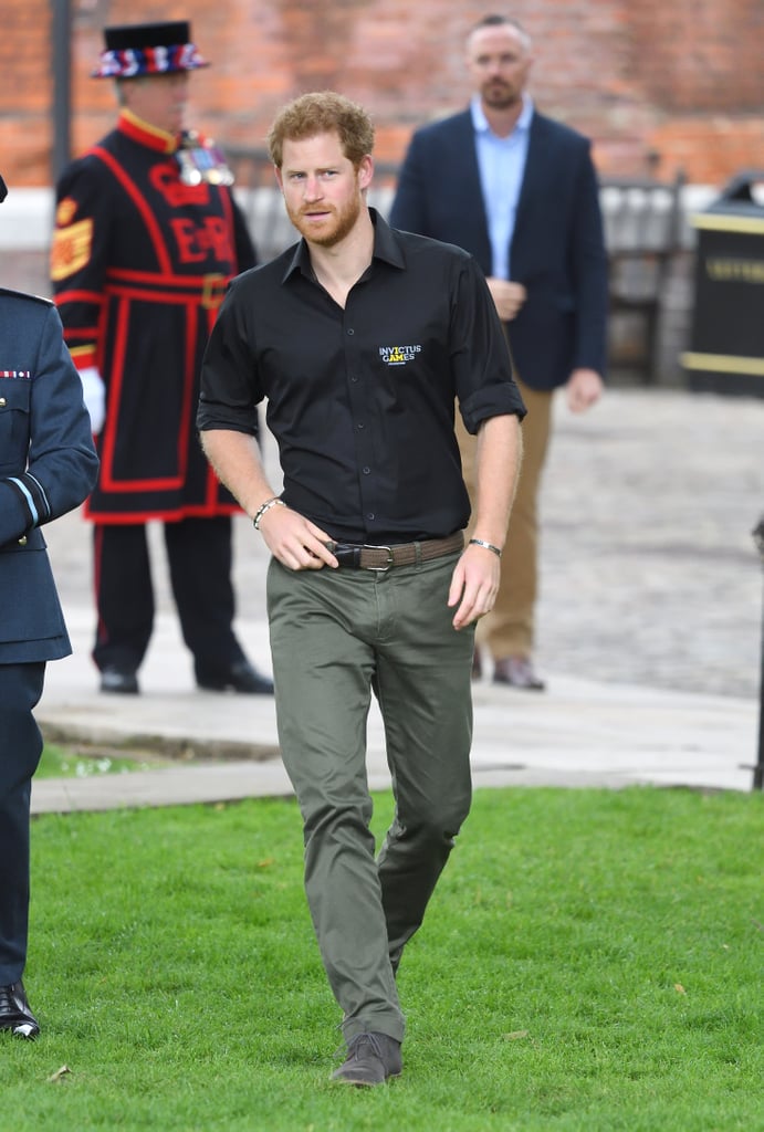 During the launch of the 2017 Invictus Games, Harry rolled up the sleeves of his black shirt, which he wore with khaki trousers.