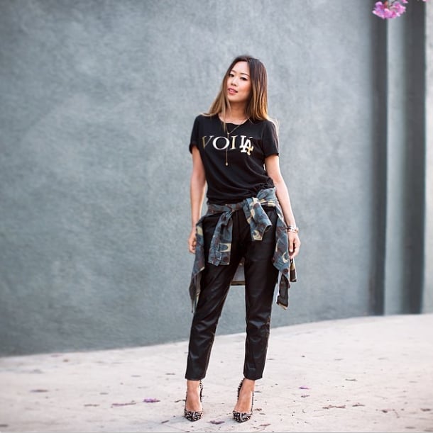 A black tee might be basic, but with leather pants and a touch of camo, it's infinitely cooler. 
Source: Instagram user songofstyle