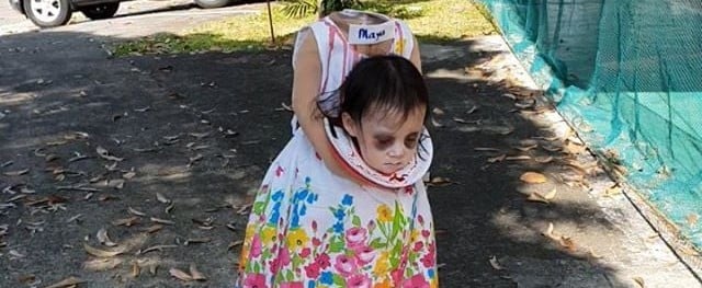 This Girl's Eerily Realistic "Headless" Costume Will Make You Want to Cancel Halloween