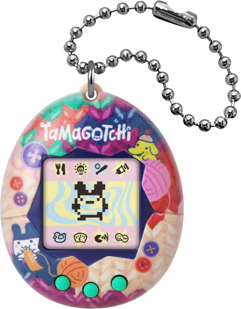 Tamagotchi Original ($20)
A Tamagotchi at a White Elephant swap? Instant chaos. It's pure childhood nostalgia and totally portable — they can clip it to their keys or bag and tend to their tiny pixel pet on the go.