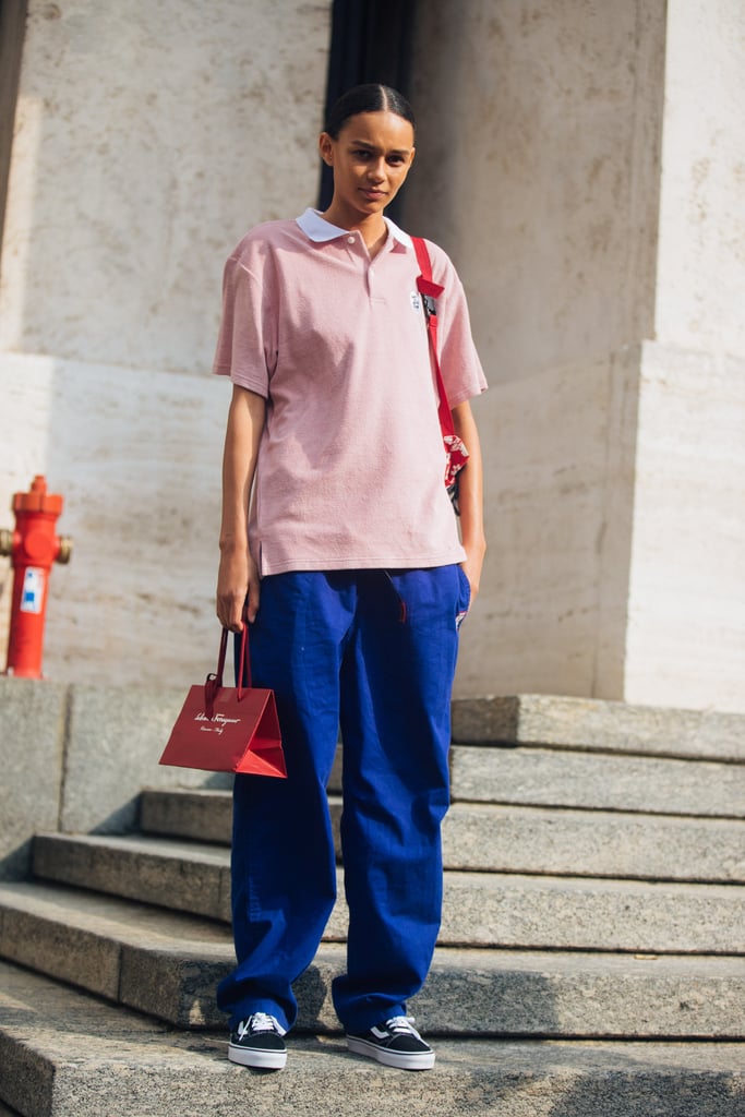 Binx Walton Rocked a Pink Polo Shirt, Blue Wide-Leg Trousers, and Vans After the Ferragamo Show