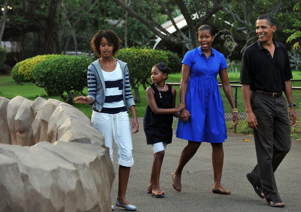 Michelle in a cobalt blue shirtdress at the zoo in Honolulu, Hawaii.