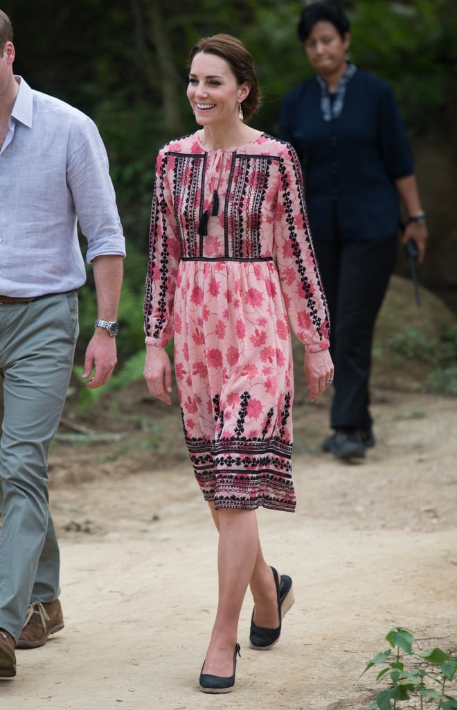 On safari in India, Kate paired a pink-and-black Topshop dress for $111 with $89 wedges from Dune.