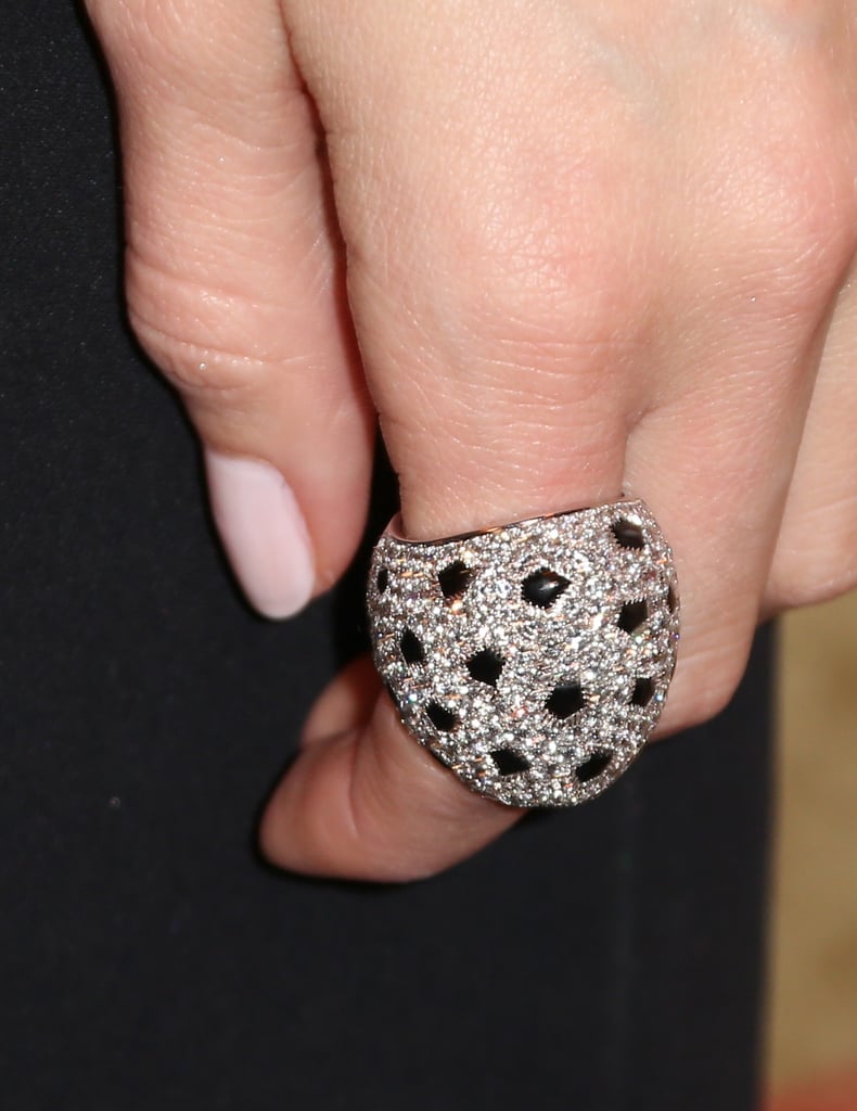 We have serious accessory envy over Allison Williams's white gold, onyx, and diamond Cartier Lobi ring.