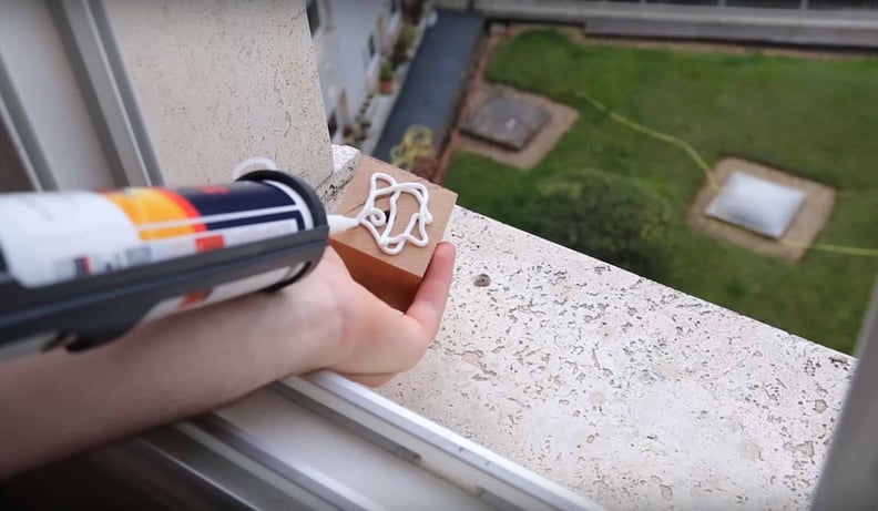 He glued square blocks of wood to the windows to be sure they were nice and sturdy.