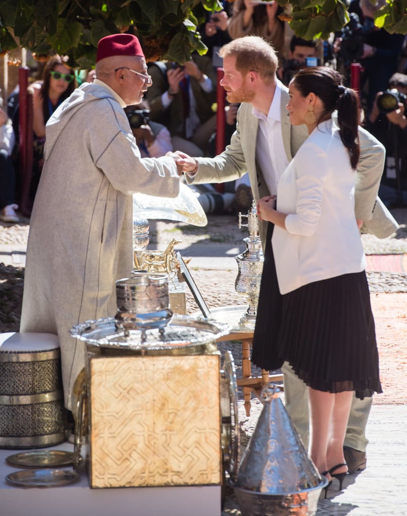 Prince Harry Helping Meghan Markle Fix Her Hair in Morocco