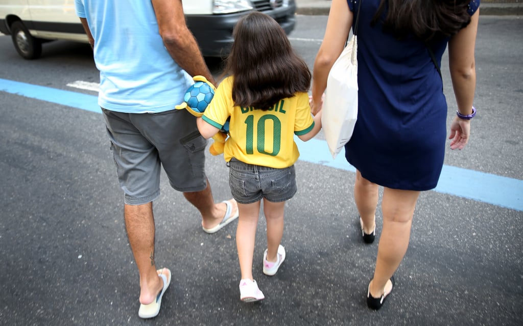 A little girl showed off her Brazil jersey.