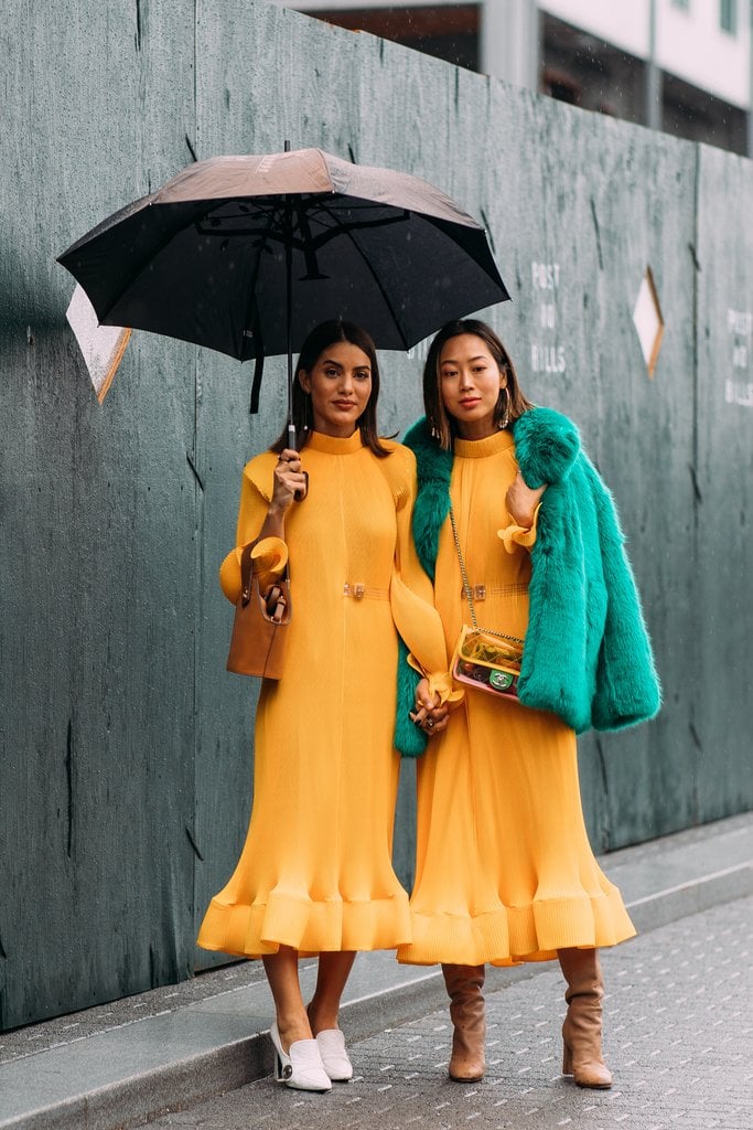 If you are going to wear the same Tibi dress as your bestie, be sure to sport different accessories like Camila Coelho and Aimee Song.