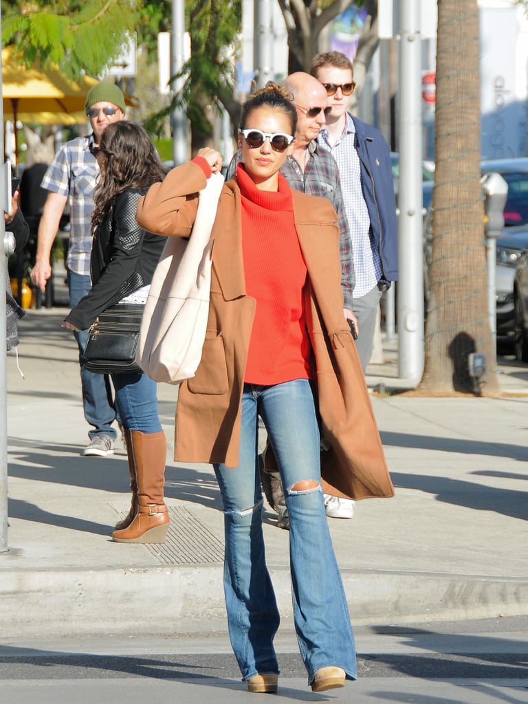 The actress nailed the monochrome color combo in December '15, rocking her distressed jeans with orange and brown pieces.