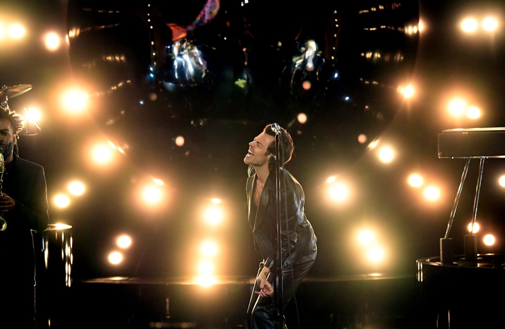 Harry Styles Wears Leather Suit and Fuzzy Scarf For Grammys