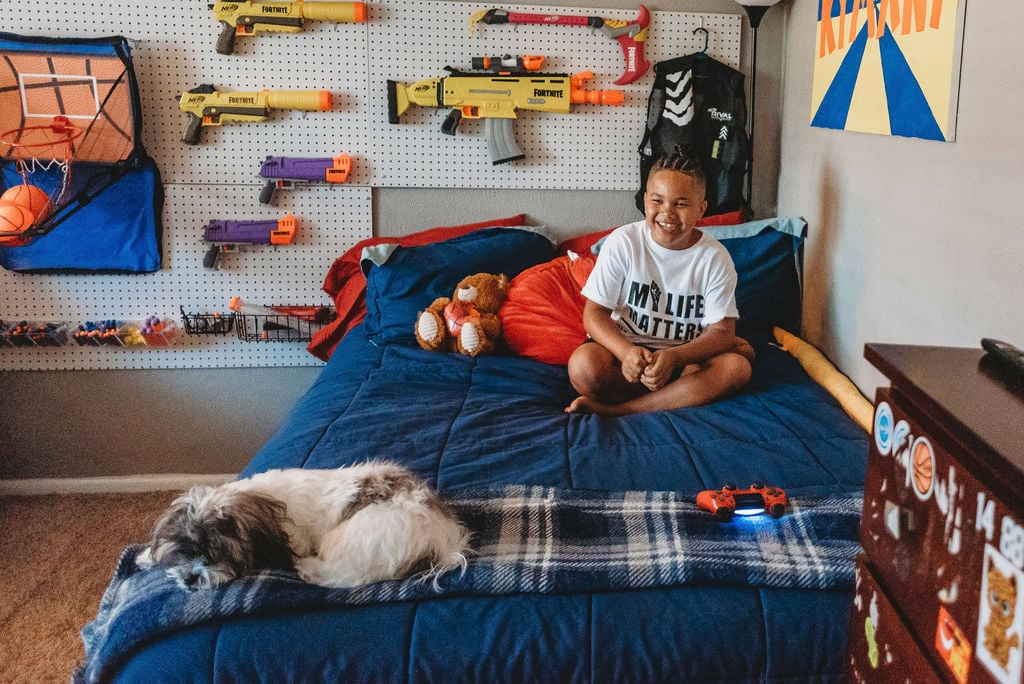 "The boys love Nerf guns and having 'battles' together. However, their mother is uncomfortable with them taking them out of the house to play because she worries someone might mistake them for real guns."