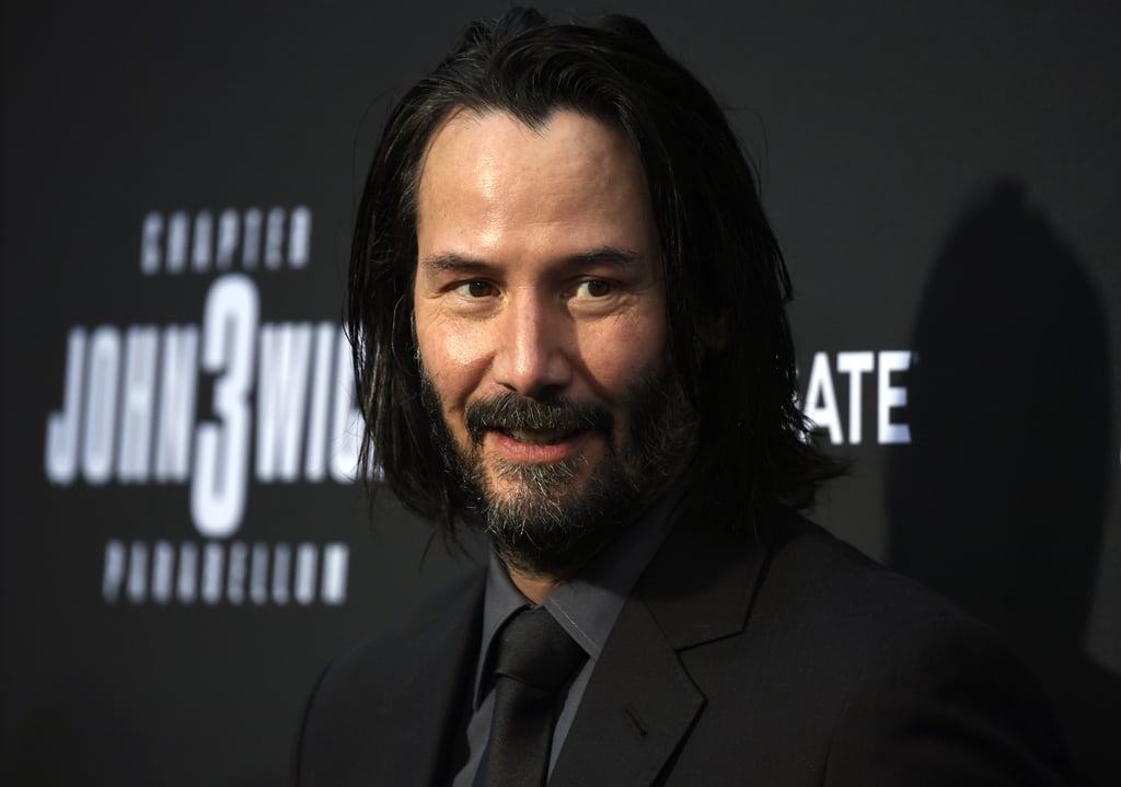 Pictures of Keanu Reeves Smiling