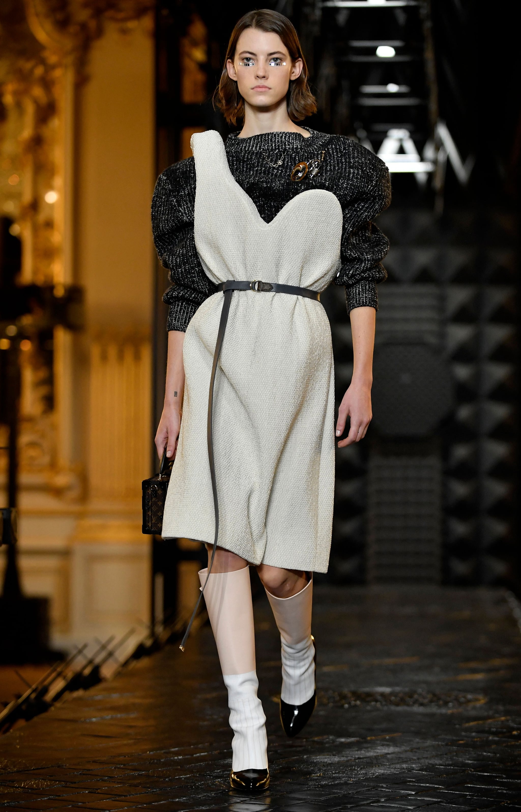 Zendaya Takes Hit From Umbrella At Louis Vuitton Fashion Show