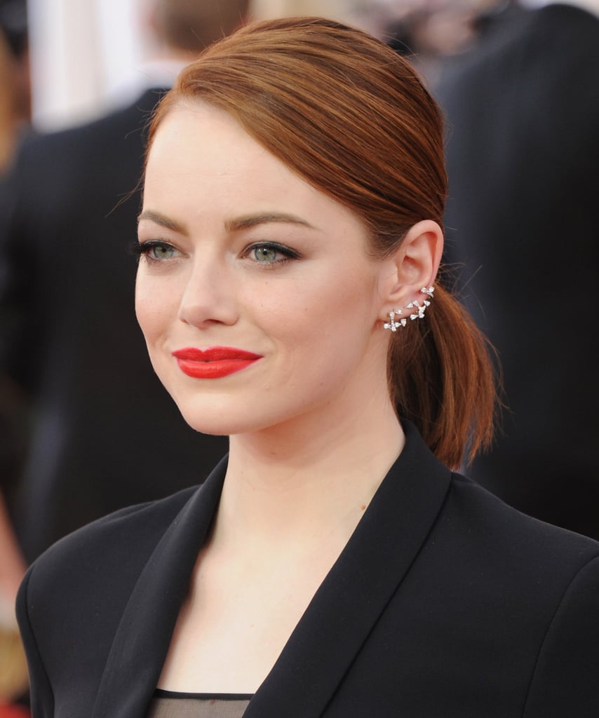 Emma Stone's diamond Repossi ear cuff was just as unexpected as the rest of her look, but the star always makes a statement with ease.