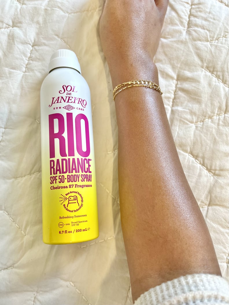 Sol de Janeiro Rio Radiance SPF 50 Body Spray Sunscreen on Tan Skin