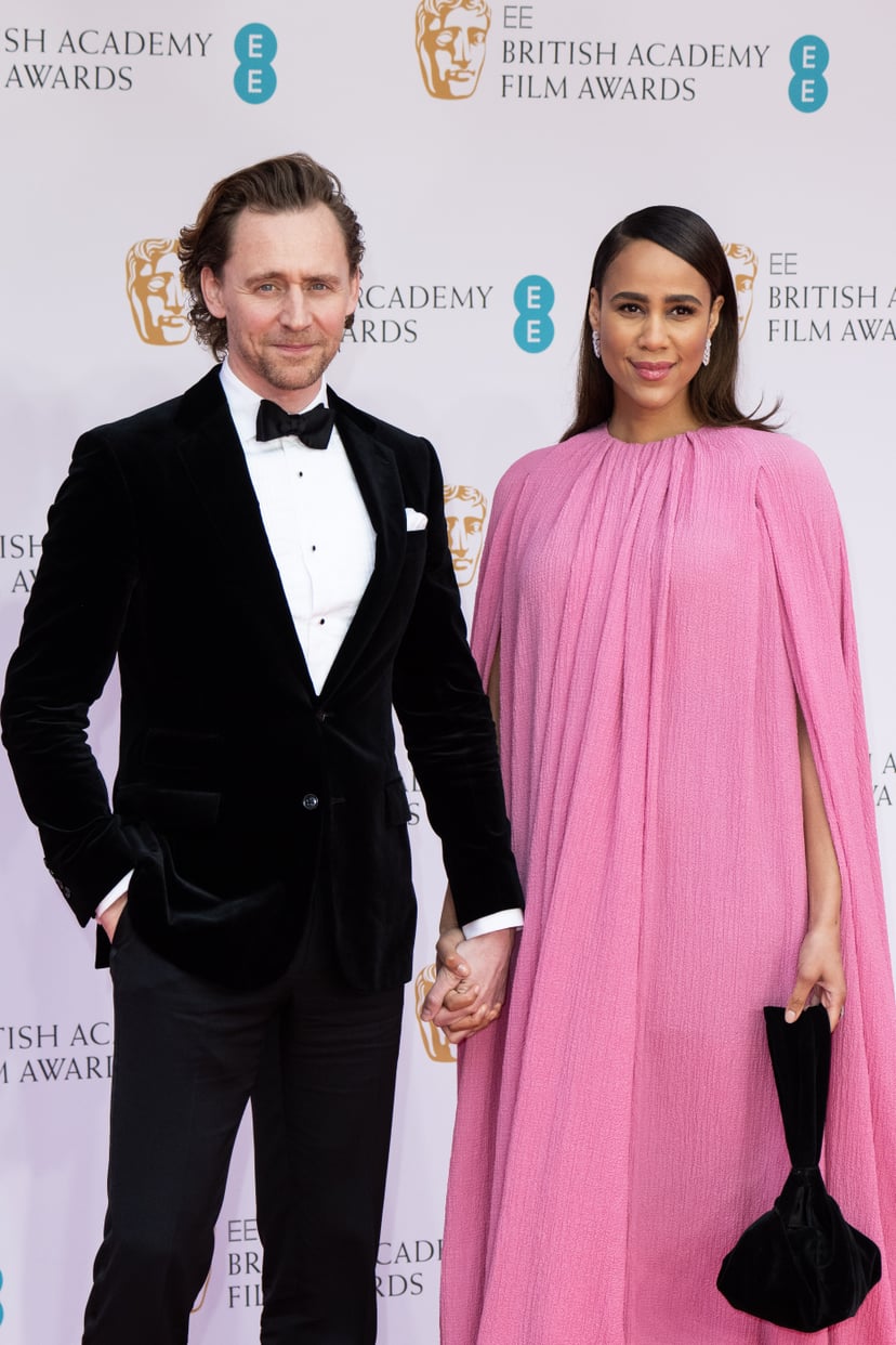 LONDON, ENGLAND - MARCH 13: (L-R) Tom Hiddleston and Zawe Ashton attend the EE British Academy Film Awards 2022 at Royal Albert Hall on March 13, 2022 in London, England. (Photo by Jeff Spicer/Getty Images)