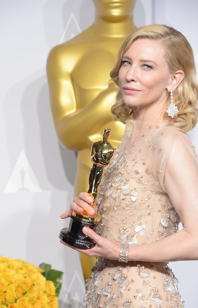 Cate Blanchett struck a pose with her best actress Academy Award for Blue Jasmine.