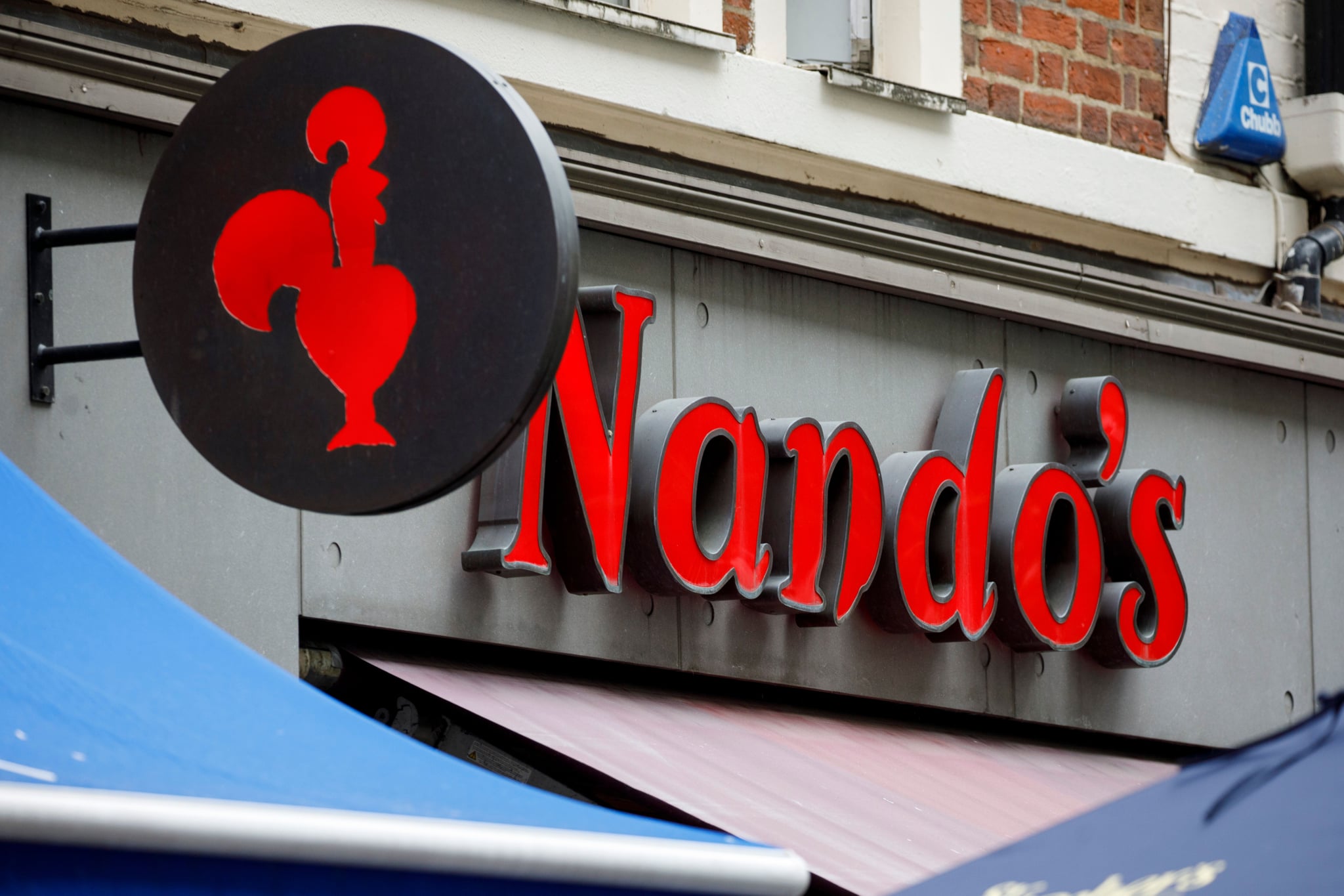 A Nando's chicken restaurant is pictured in central London on September 11, 2019. (Photo by Tolga AKMEN / AFP)        (Photo credit should read TOLGA AKMEN/AFP via Getty Images)