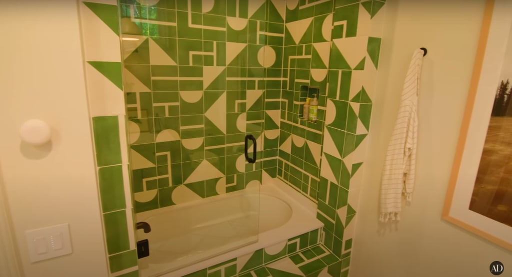 Plus, some awesome green geometric tile is featured in Luca's bathroom.