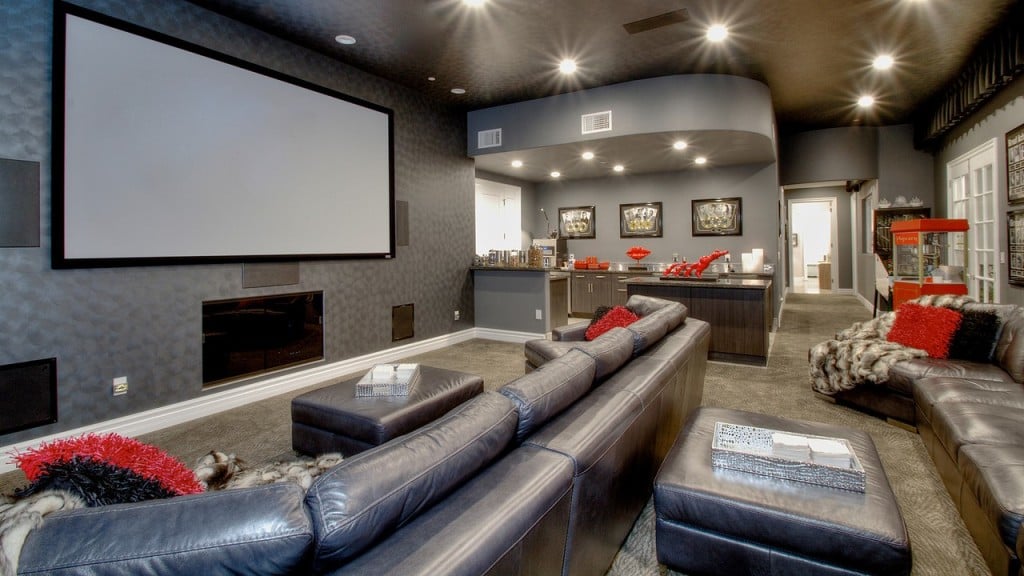 Able to accommodate more than 20 guests and loaded with high-tech options such as HD projection and surround sound, this home theater is perfect for entertaining a large family.