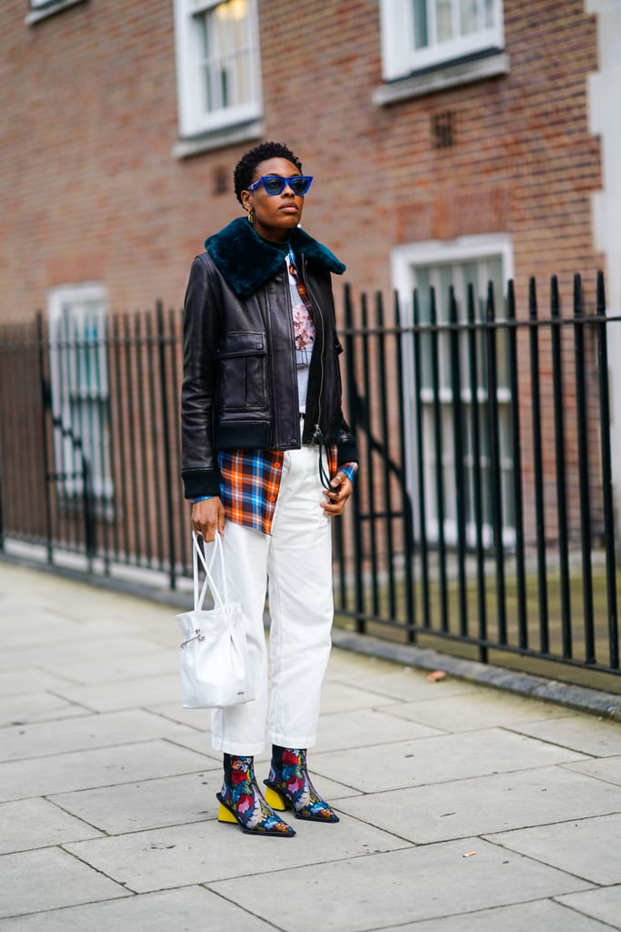 white jeans black leather jacket