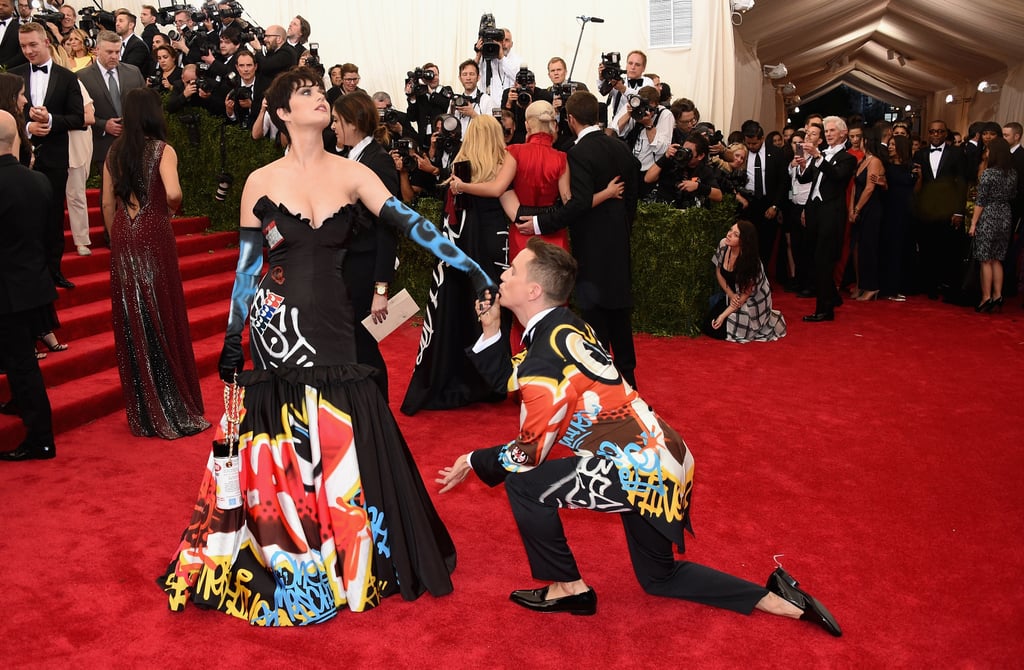 Katy Perry and Jeremy Scott added some theatrics to their walk down the red carpet.